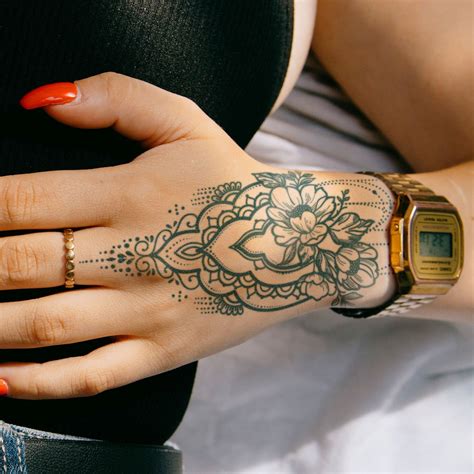 mandala hand tattoos|feminine mandala tattoos.